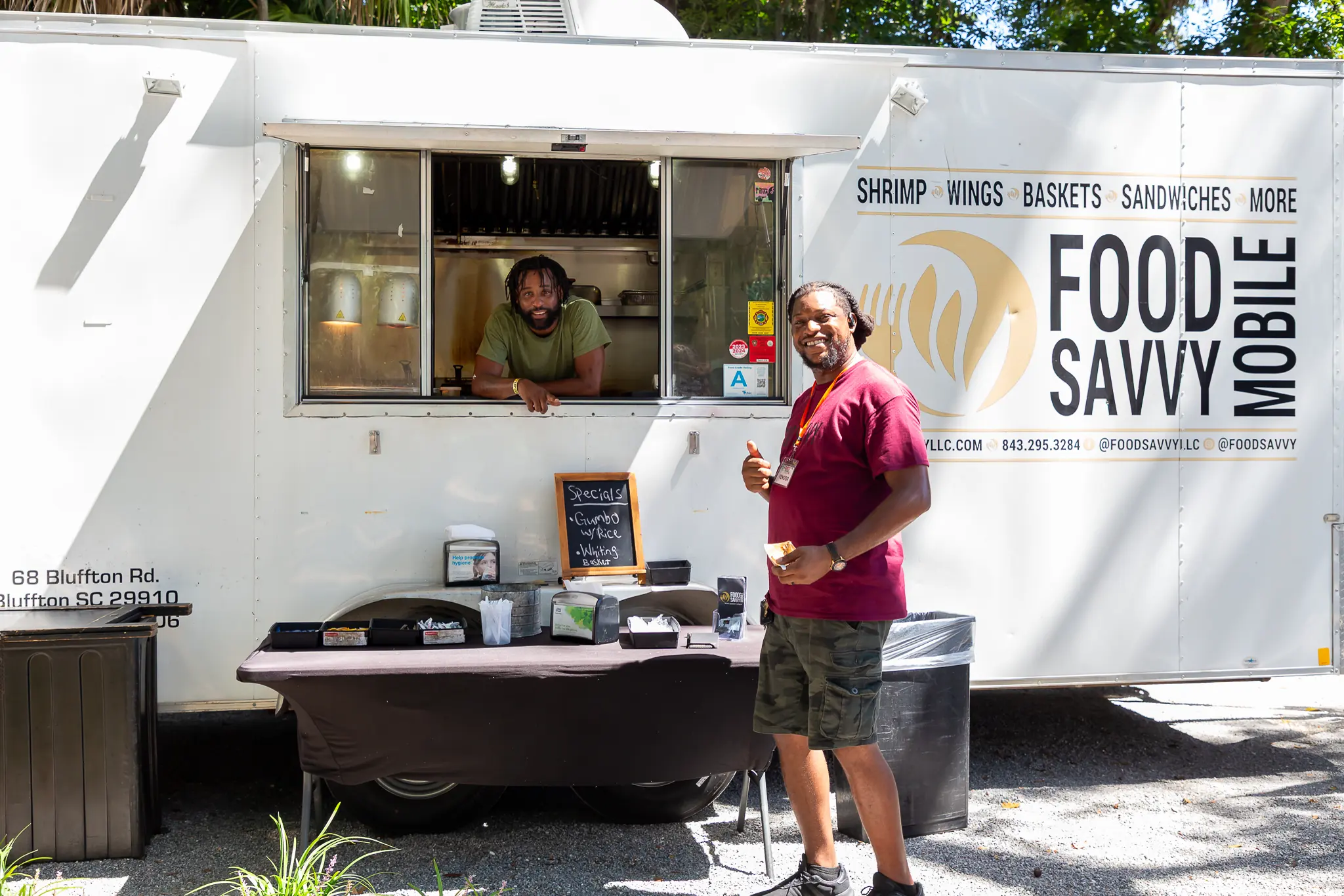 Food Savvy Mobile owners at their food truck